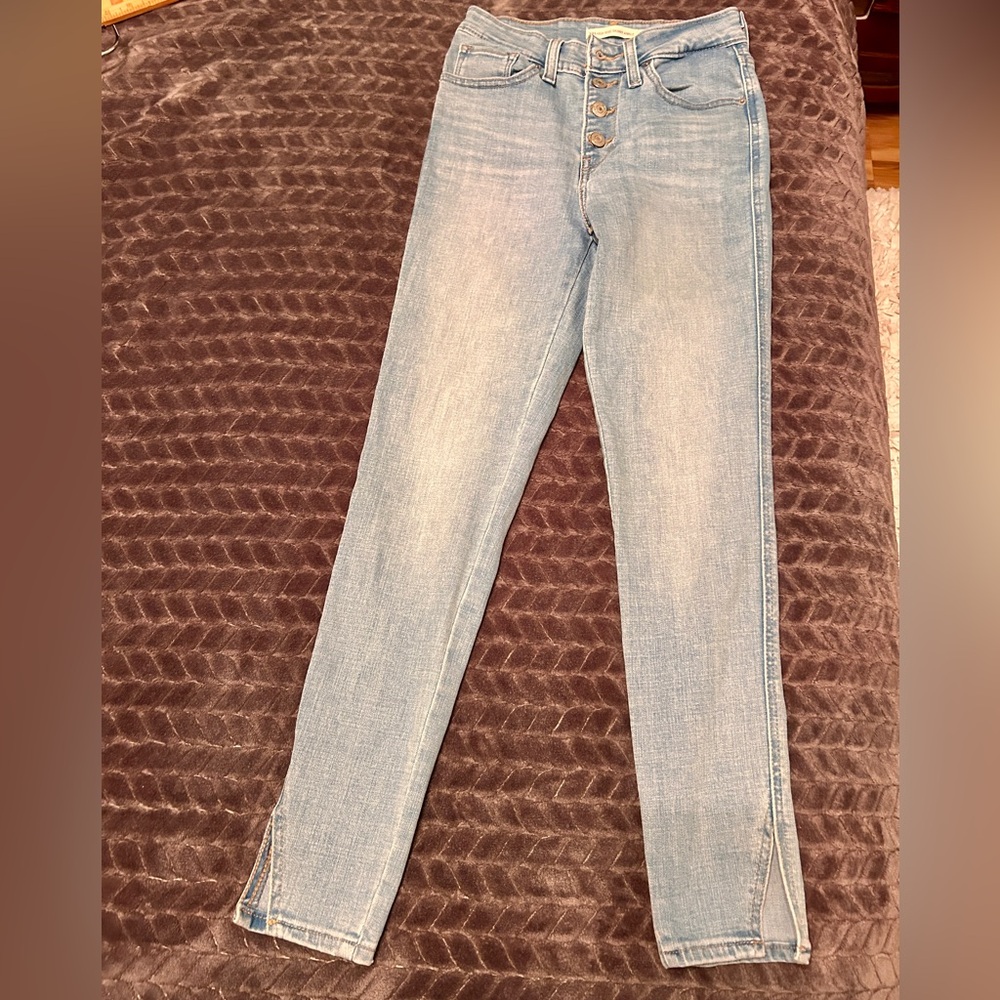 Levi's Light Blue button up Skinny Jeans with slits on bottom legs